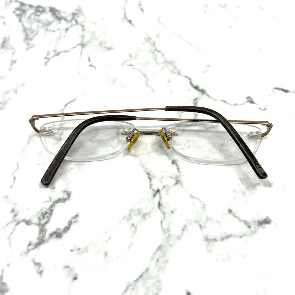 Ralph Lauren RL5014 9019 Eyeglasses Rimless Gold Oval 50-16-135